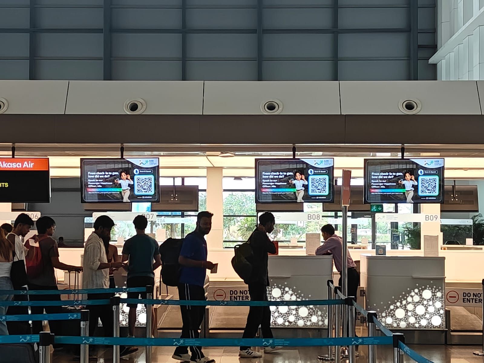 Voicebox on the digital screens above the check-in counters at GOX